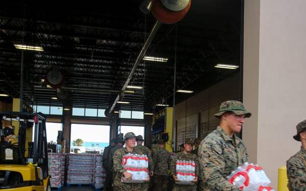 Marines and Sailors distribute supplies in aftermath of Hurricane Irma