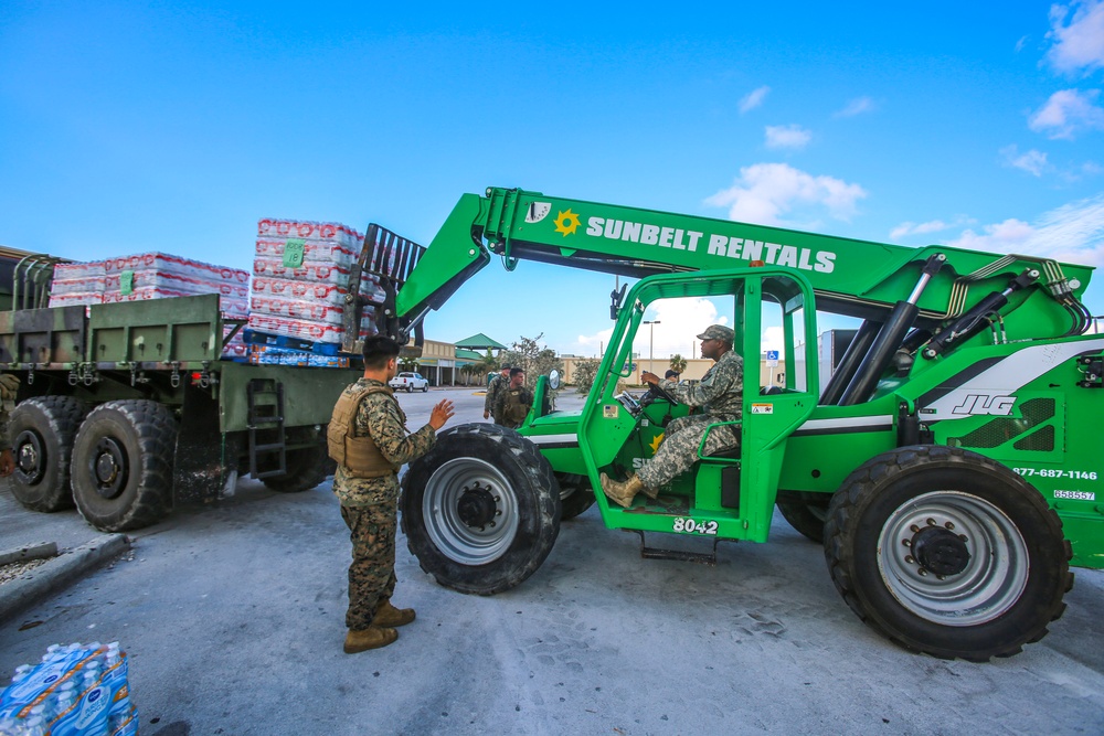 Marines and Sailors distribute supplies in aftermath of Hurricane Irma