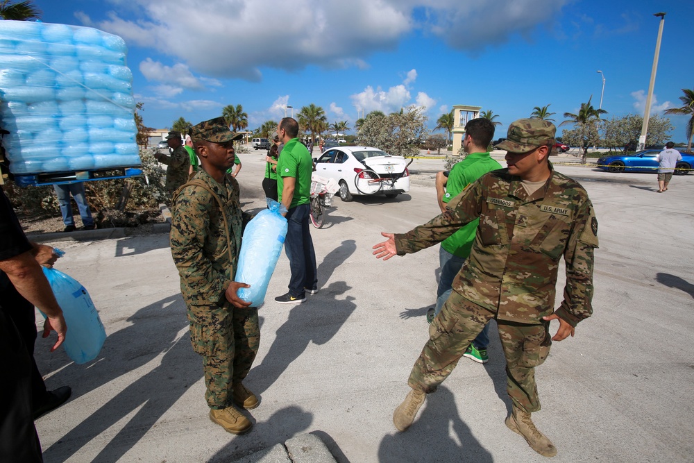 Marines and Sailors distribute supplies in aftermath of Hurricane Irma