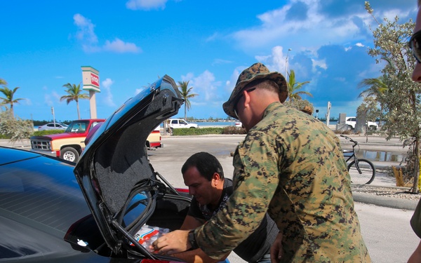 Marines and Sailors distribute supplies in aftermath of Hurricane Irma