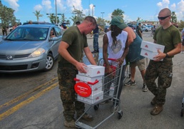 Marines and Sailors distribute supplies in aftermath of Hurricane Irma