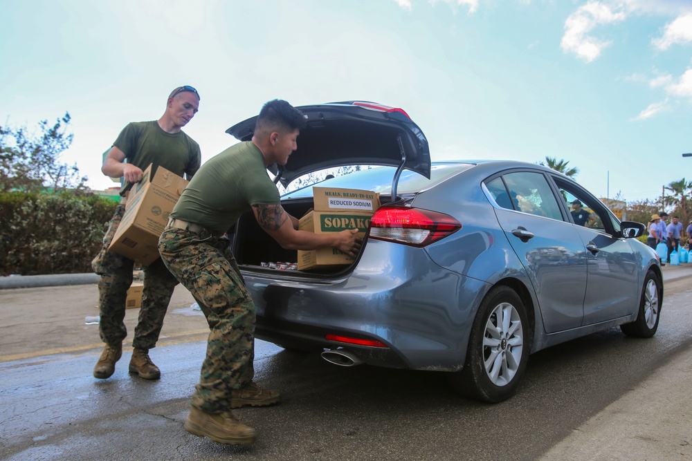 Marines and Sailors distribute supplies in aftermath of Hurricane Irma