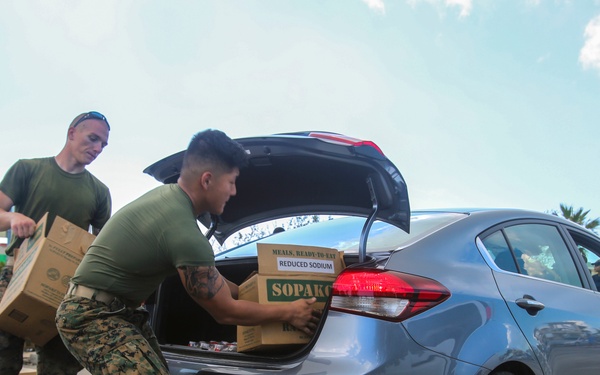 Marines and Sailors distribute supplies in aftermath of Hurricane Irma