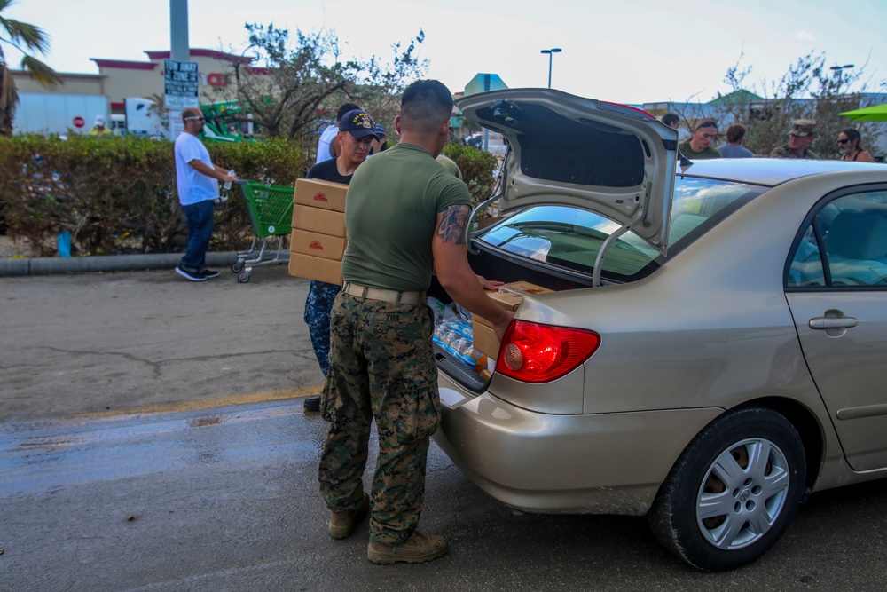 Marines and Sailors distribute supplies in aftermath of Hurricane Irma