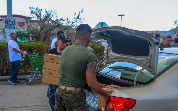 Marines and Sailors distribute supplies in aftermath of Hurricane Irma