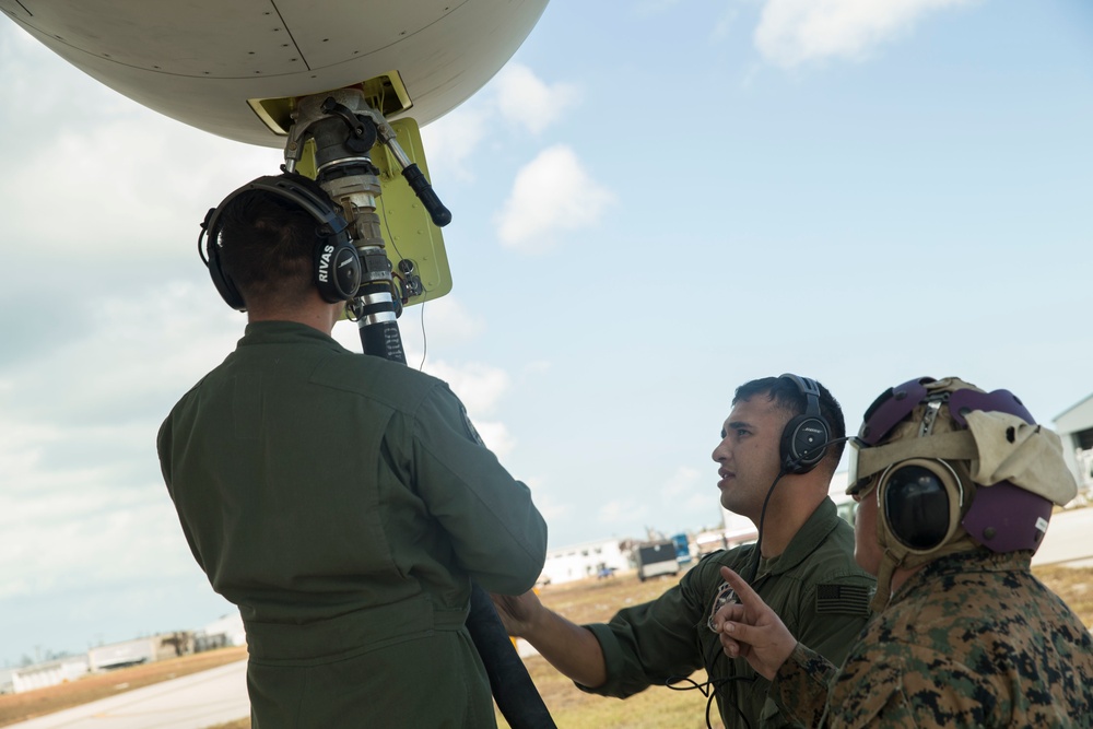 Marines of VMGR-234 deliver fuel and food to a FARP in Marathon, Florida