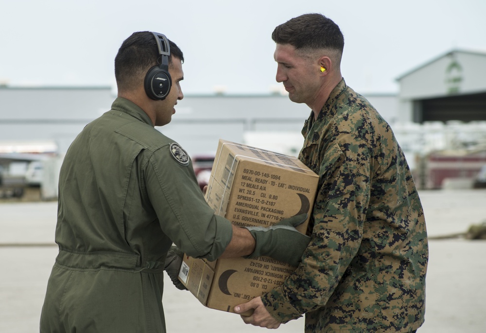 Marines of VMGR-234 deliver fuel and food to a FARP in Marathon, Florida