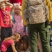 Local Children Fascinated By Soldiers
