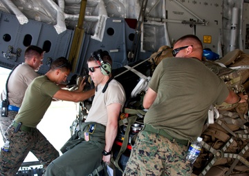 Service members with JTF-LI prepare a C-17 for departure in support of HADR.