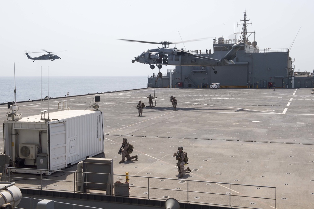 15th MEU Marines assigned to the USS Pearl Harbor perform VBSS aboard the Lewis B. Puller