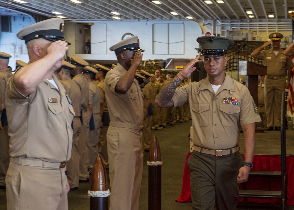 Sailors of the amphibious assault ship USS Bonhomme Richard (LHD 6) conduct a chief pinning ceremony