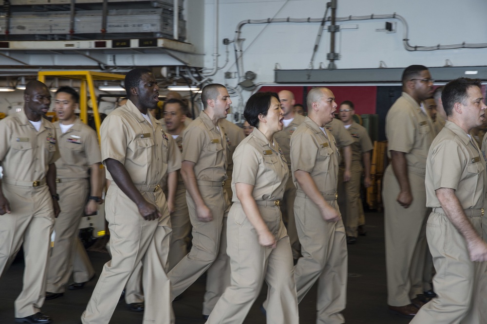 Sailors of the amphibious assault ship USS Bonhomme Richard (LHD 6) conduct a chief pinning ceremony