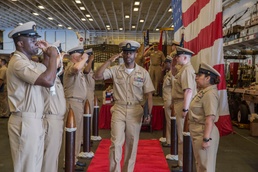Sailors of the amphibious assault ship USS Bonhomme Richard (LHD 6) conduct a chief pinning ceremony