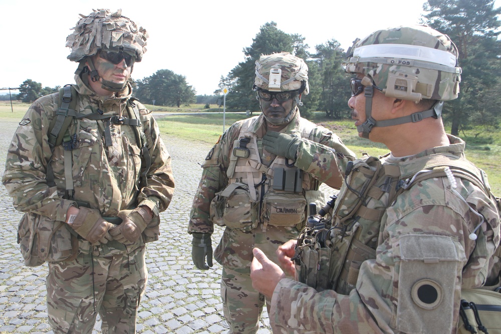 Leaders from the Michigan Army National Guard’s 1st Battalion, 125th Infantry Regiment and the Royal Wessex Yeomanry, a British Reserve Armor Regiment, Discuss Combined Arms