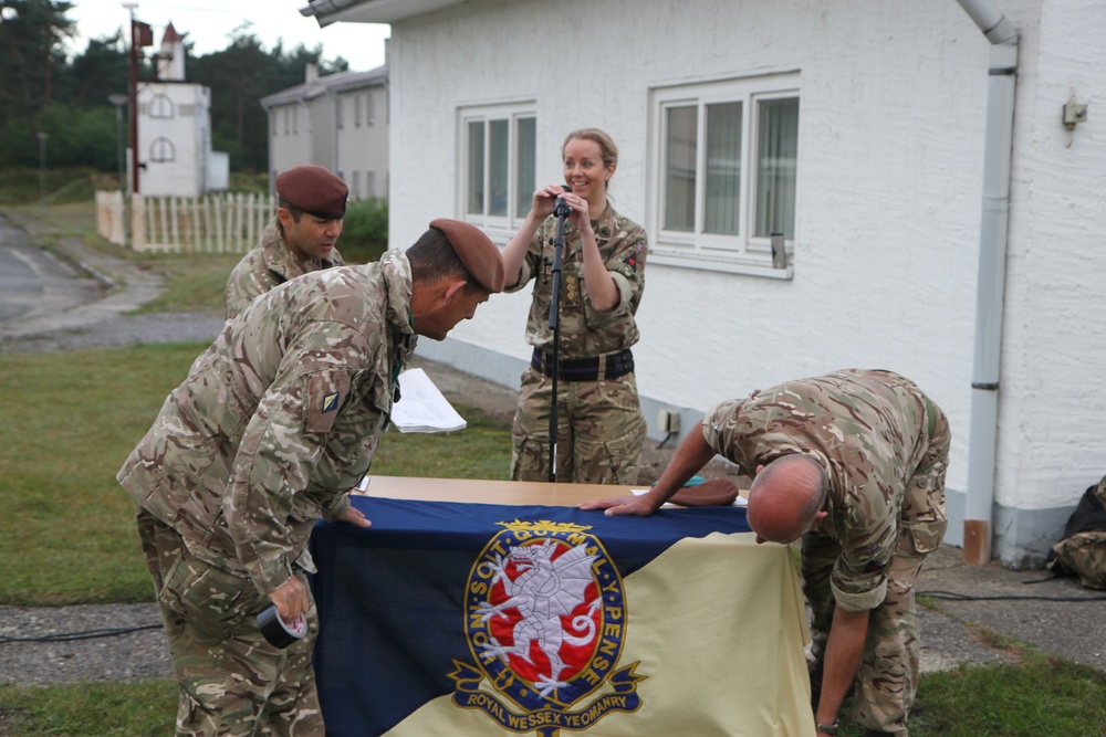 Michigan Army National Guardsmen of C Co., 1st Bn., 125th Inf. Reg., and Tankers of the British Reserve Royal Wessex Yeomanry, Participate in a Joint Religious Service