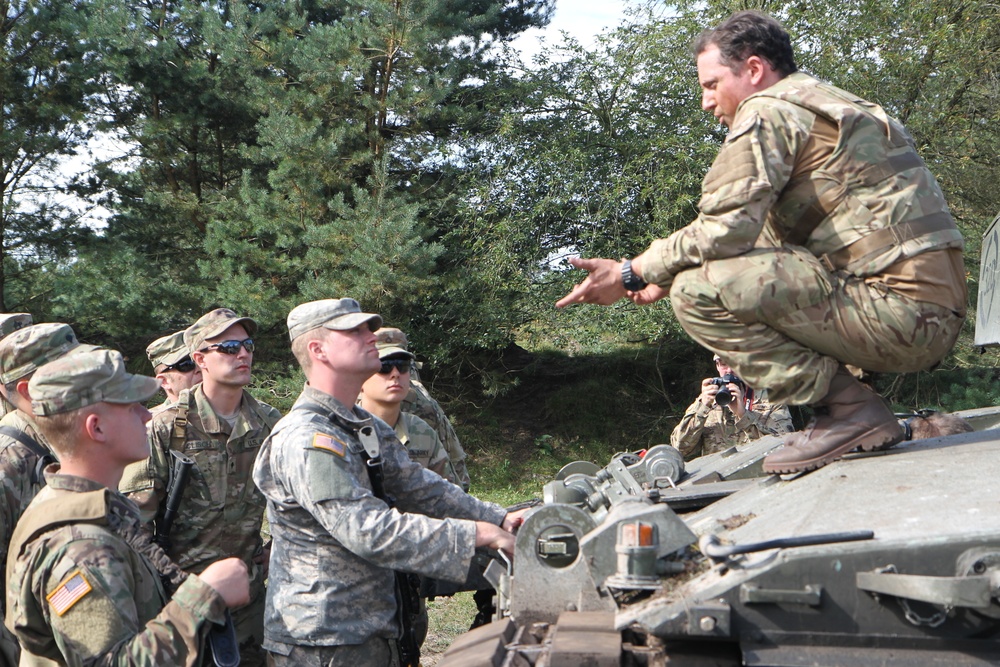Soldiers of the Michigan Army National Guard’s C Co. 1-125IN Learn about the British Challenger 2 Tank