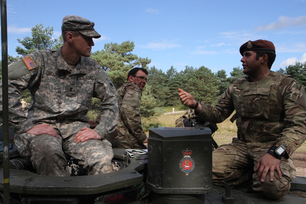 Soldiers of the Michigan Army National Guard’s C Co. 1-125IN Learn about the British Challenger 2 Tank