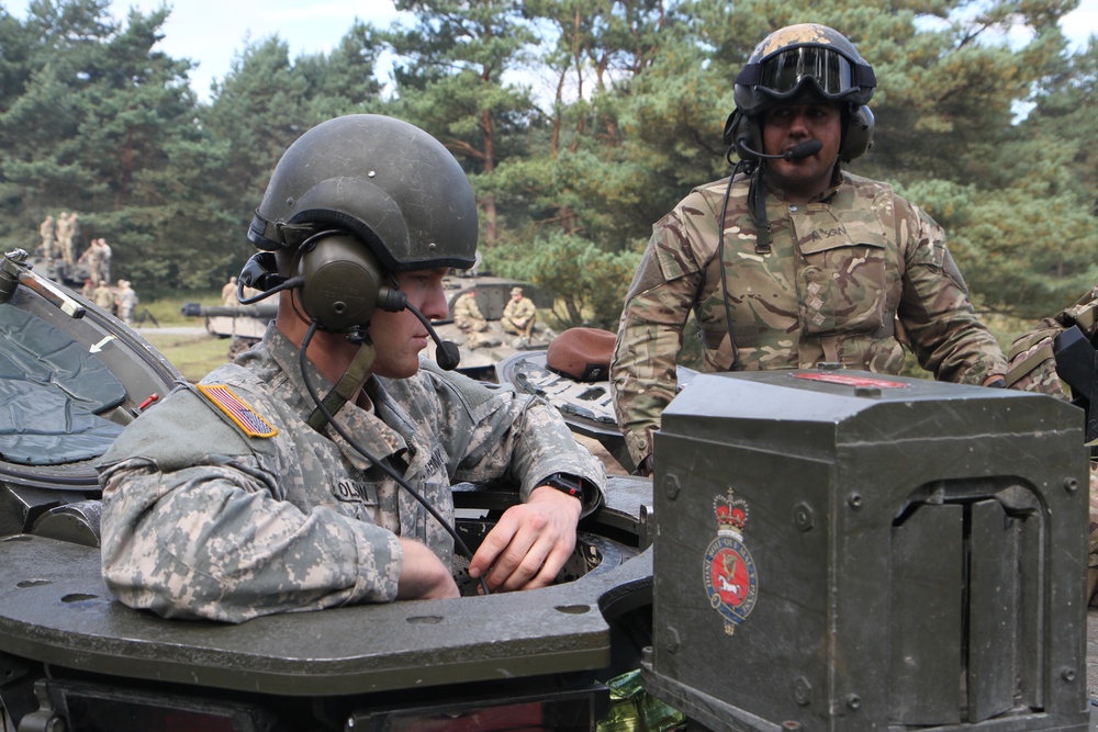 Soldiers of the Michigan Army National Guard’s C Co. 1-125IN Learn about the British Challenger 2 Tank