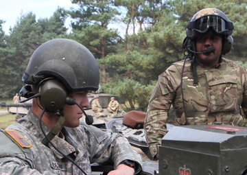 Soldiers of the Michigan Army National Guard’s C Co. 1-125IN Learn about the British Challenger 2 Tank