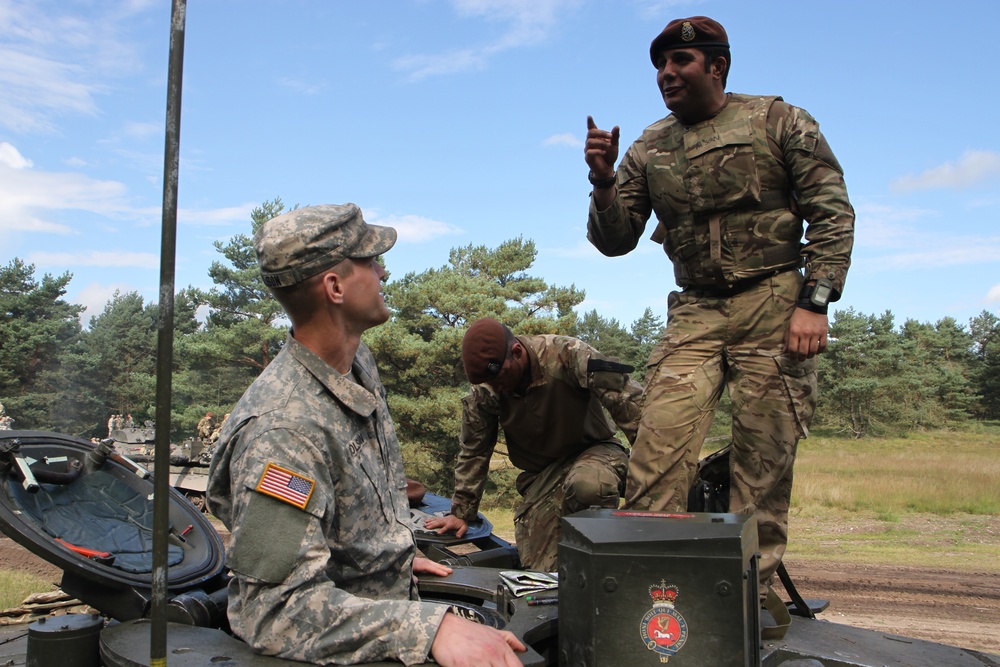 Soldiers of the Michigan Army National Guard’s C Co. 1-125IN Learn about the British Challenger 2 Tank