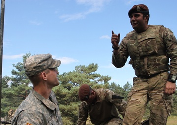 Soldiers of the Michigan Army National Guard’s C Co. 1-125IN Learn about the British Challenger 2 Tank