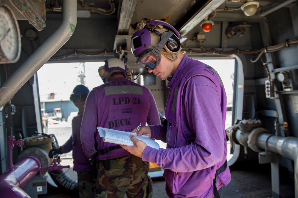 USS New York performs RAS during hurricane relief efforts