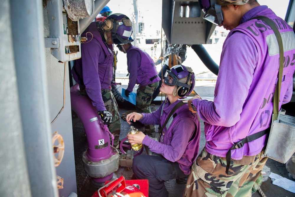 USS New York performs RAS during hurricane relief efforts