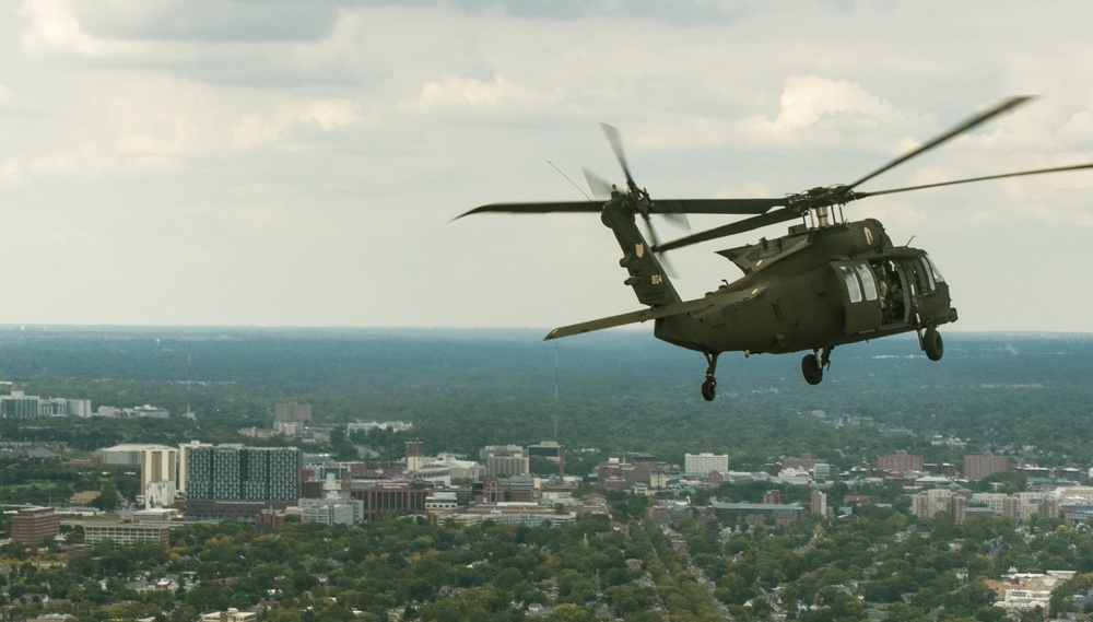 Black Hawk helicopters fly over Columbus, Ohio skyline
