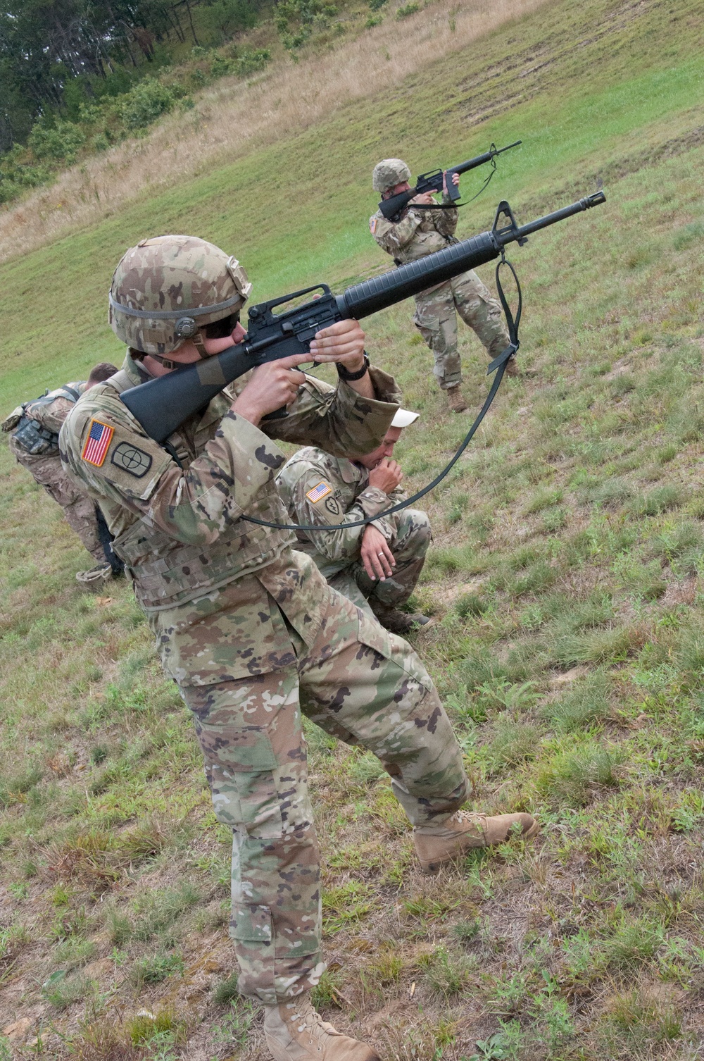 Sgt. Newlon fires his M-16A2 rifle