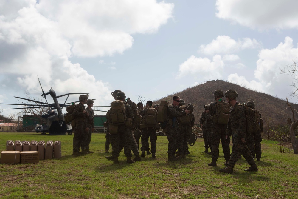 U.S. Marines, Sailors with the 26th MEU conduct relief work on Saint John