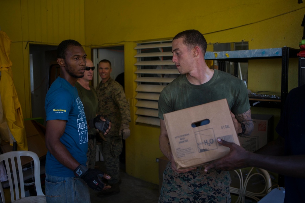 U.S. Marines, Sailors with the 26th MEU conduct relief work on Saint John