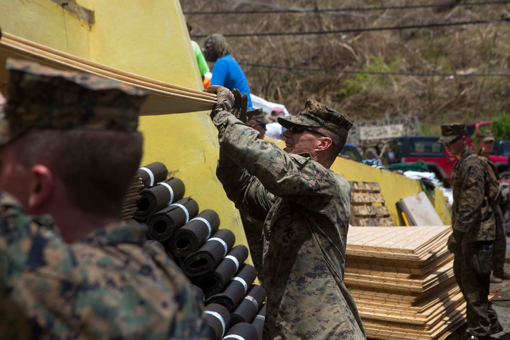 U.S. Marines, Sailors with the 26th MEU conduct relief work on Saint John