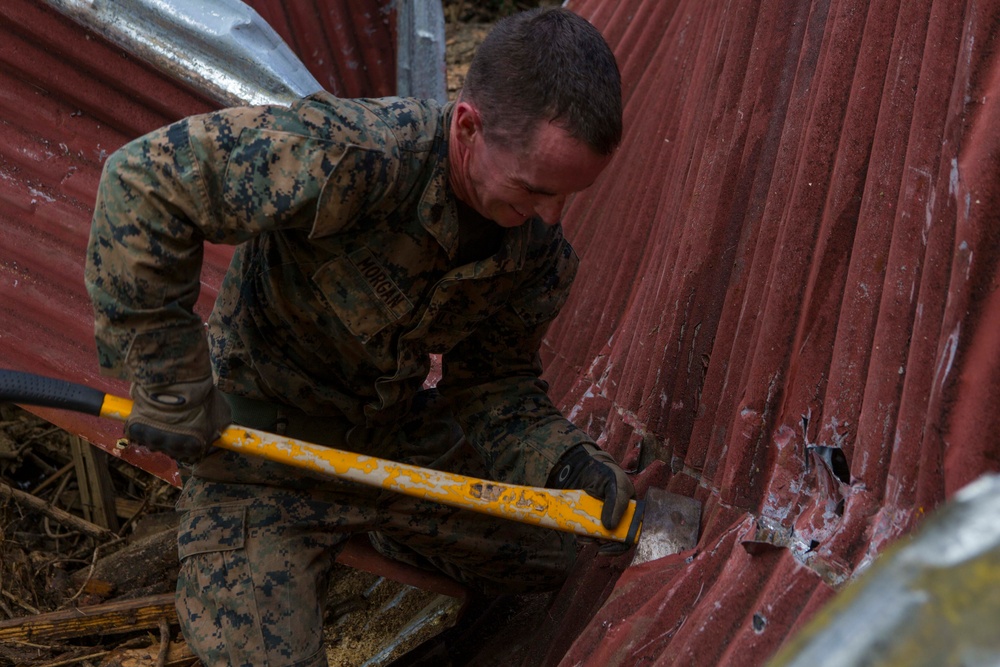 U.S. Marines, Sailors with the 26th MEU conduct relief work on Saint John