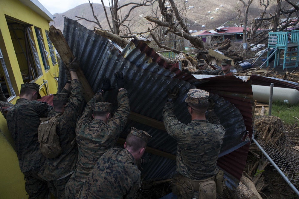 U.S. Marines, Sailors with the 26th MEU conduct relief work on Saint John