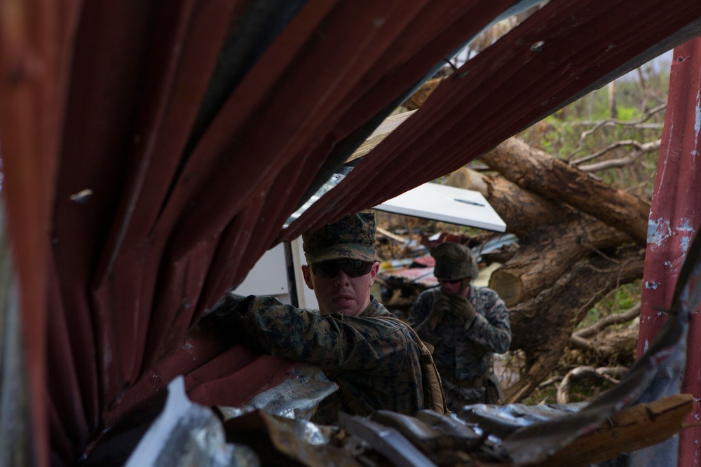 U.S. Marines, Sailors with the 26th MEU conduct relief work on Saint John