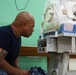 Hospital Corpsman Repairs Guatemalan Medical Equipment during SPS 17