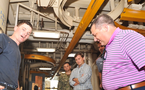 House Armed Services Committee Professional Staff Member Tour USS Emory S. Land (AS 39)