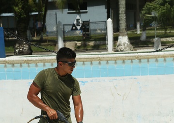 Marines Pressure Wash Swimming Pool during SPS 17