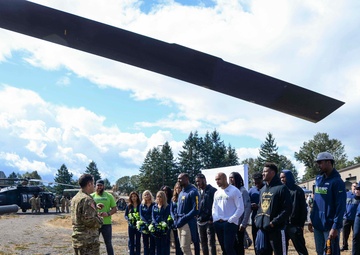 Navy Region Northwest Passes Seahawks’ 12th-Man Flag to 1st Special Forces Group