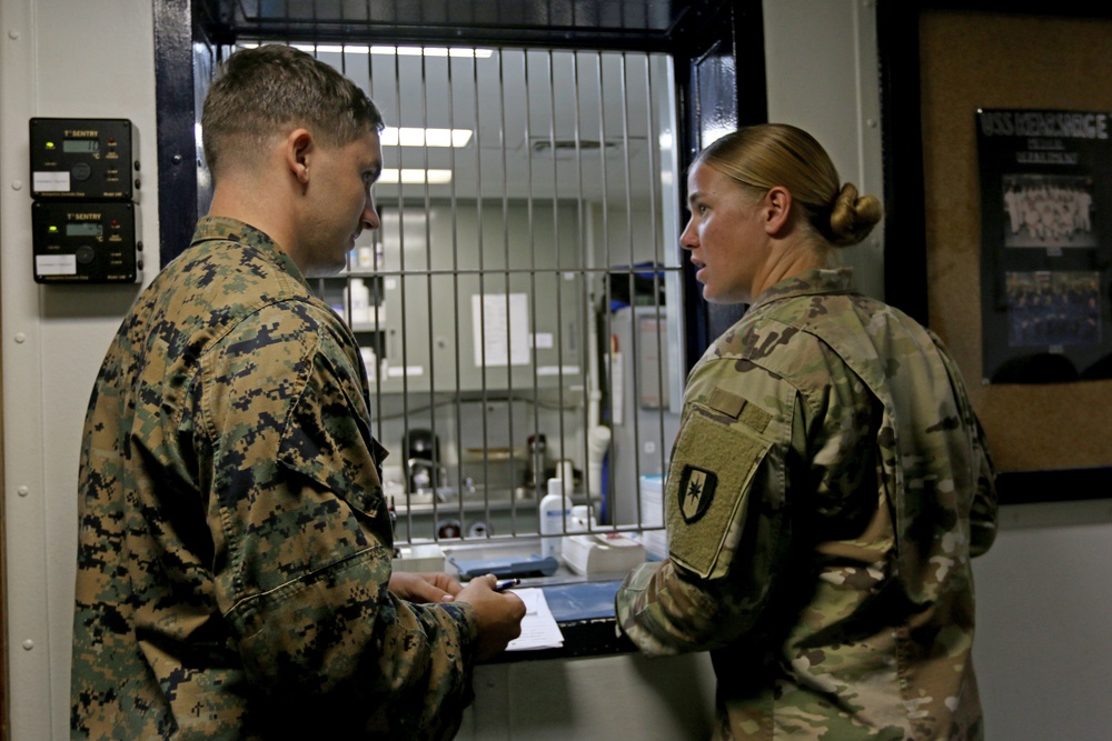 Army medics train with Navy Corpsman aboard, prepare for hurricane response