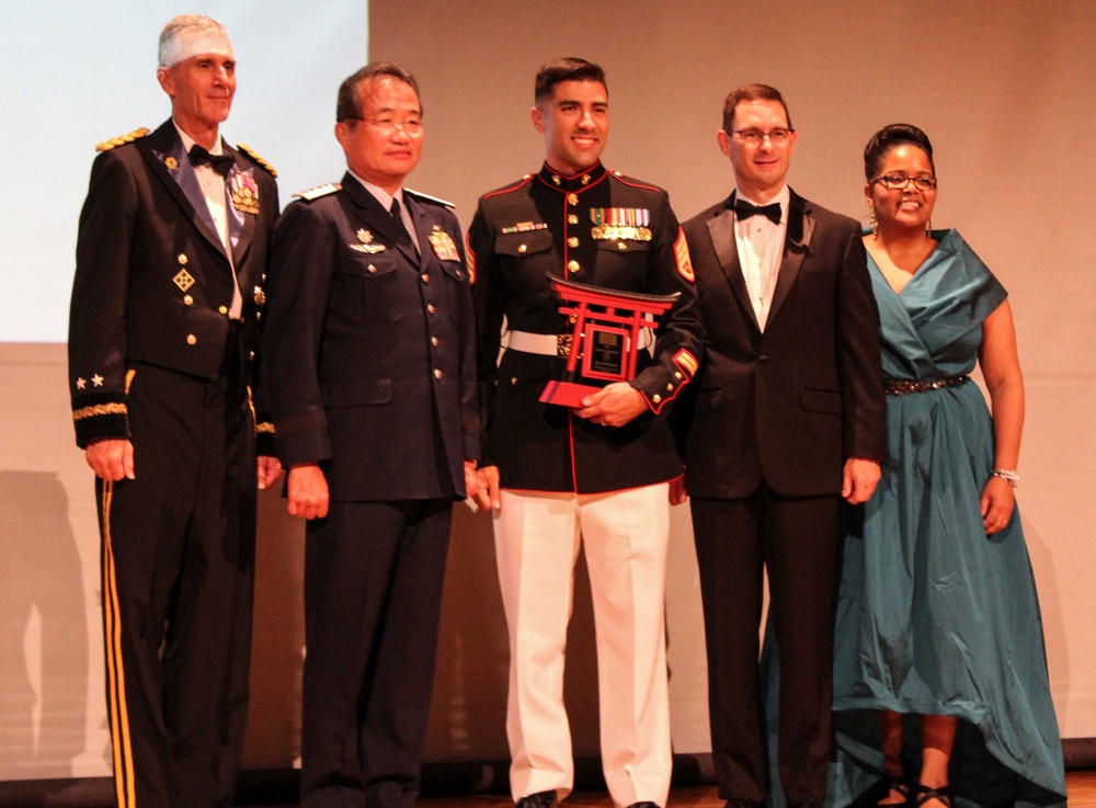 US Marine exceeds expectations, accepts award