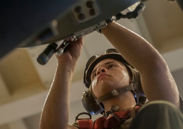 USS America Marine conducts maintenance