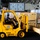 Sailor Operates Forklift