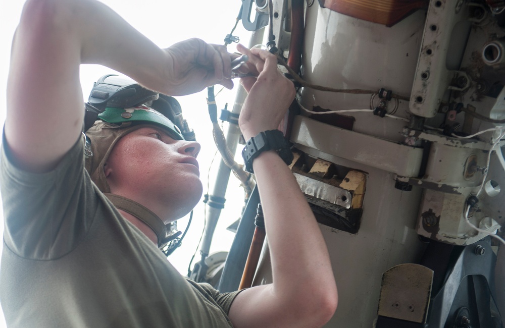 USS America Marine conducts maintenance