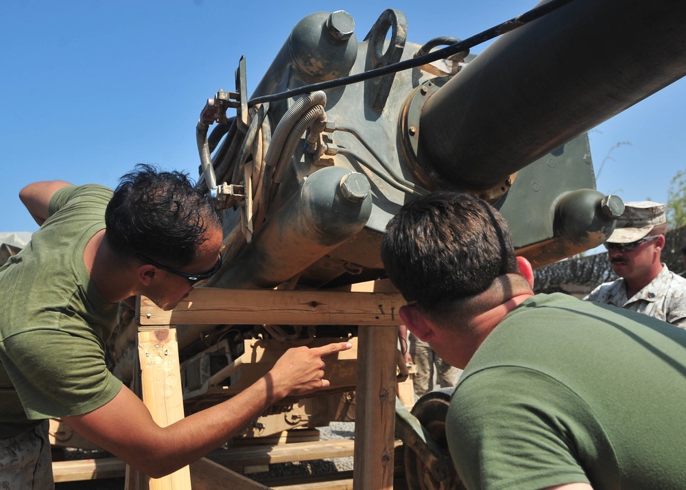 Joint project between the Combined Joint Task Force - Horn of Africa Seabees, attached to the Naval Mobile Construction Battalion 133 Detachment, and Marines with Charlie Battery, 1st Battalion, 11th Marines (1/11).