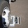 Utah's 85th CST transports equipment on a C-17 to Kauai The image shows a large truck or commercial vehicle wheel positioned on a portable axle scale or wheel weight scale placed on an asphalt surface. A digital display on the scale is visible, appearing to show a numeric reading. This appears to be a vehicle weight measurement or inspection activity.