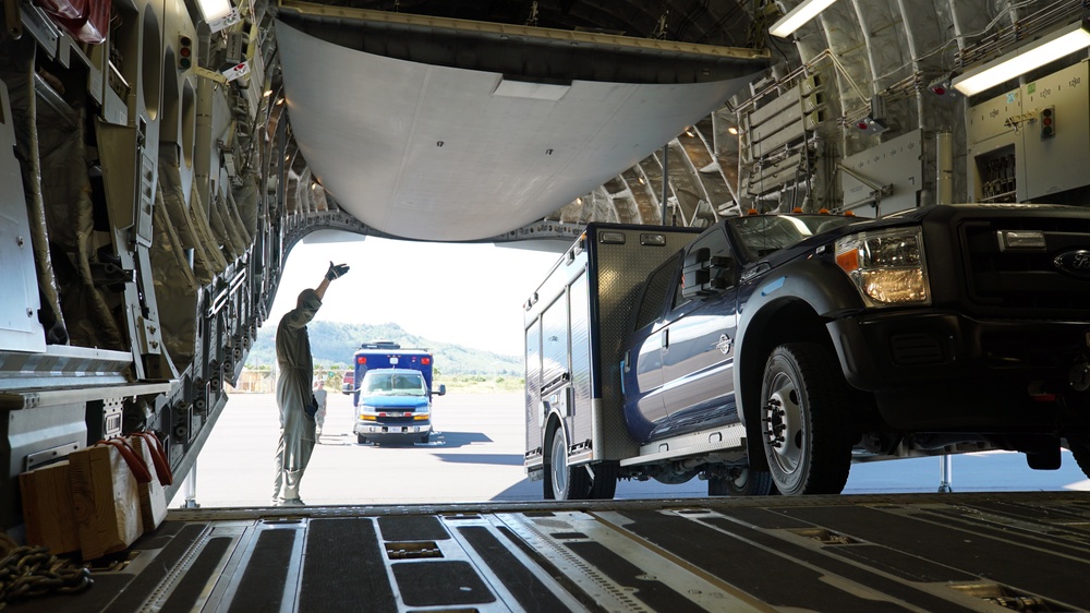 Utah's 85th CST load equipment on a C-17 to return from Kauai