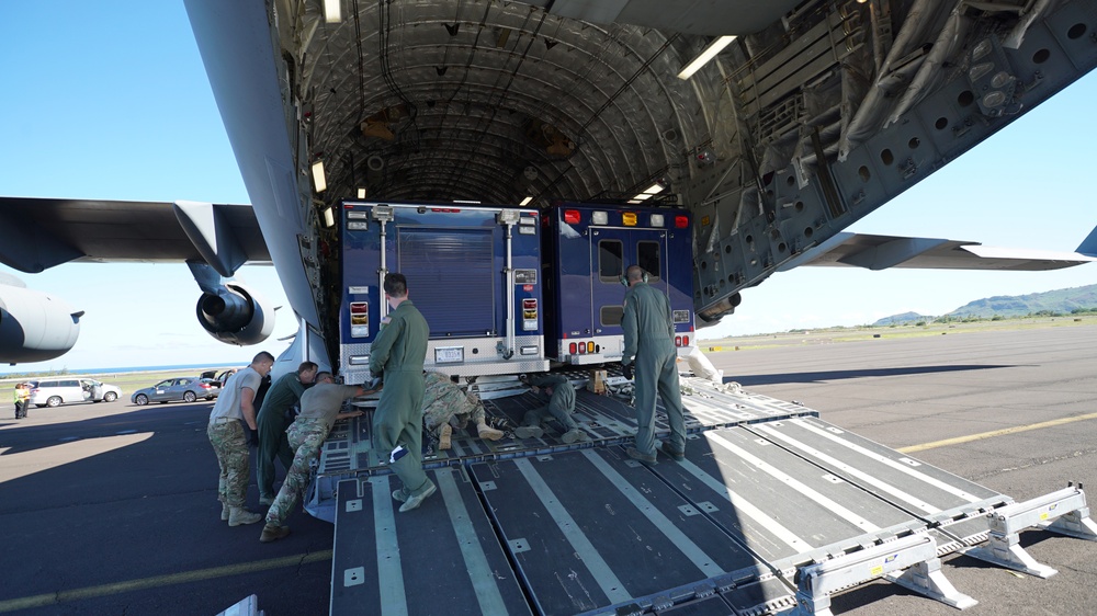 Utah's 85th CST load equipment on a C-17 to return from Kauai