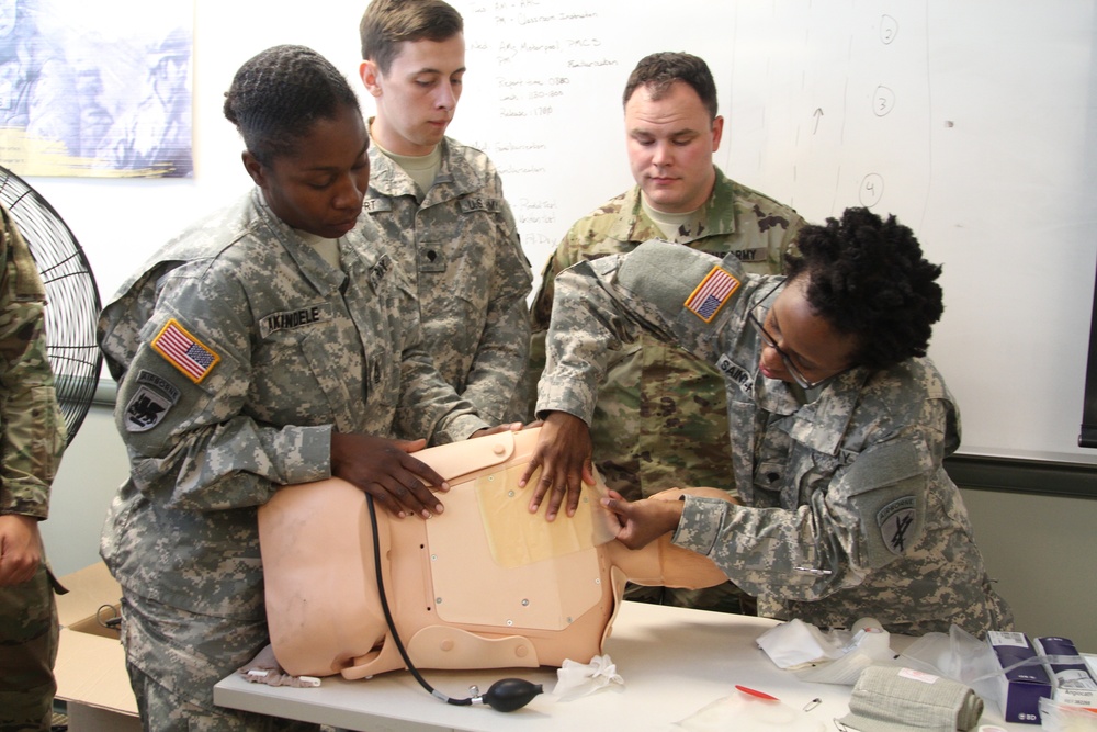 Soldiers with the 352nd CACOM attend combat lifesaver training