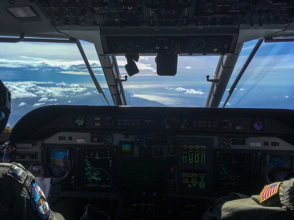 Coast Guard air station crewmembers prepare, launch for Hurricane Maria damage assessment